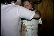 30 Yr OLD BBW SINGLE MOM IS TAPE GAGGED, BAREFOOT, BALL-GAGGED, TIT TIED, NIPPLE PINCHED AND TIED TO A COAT RACK (D73-17) 2